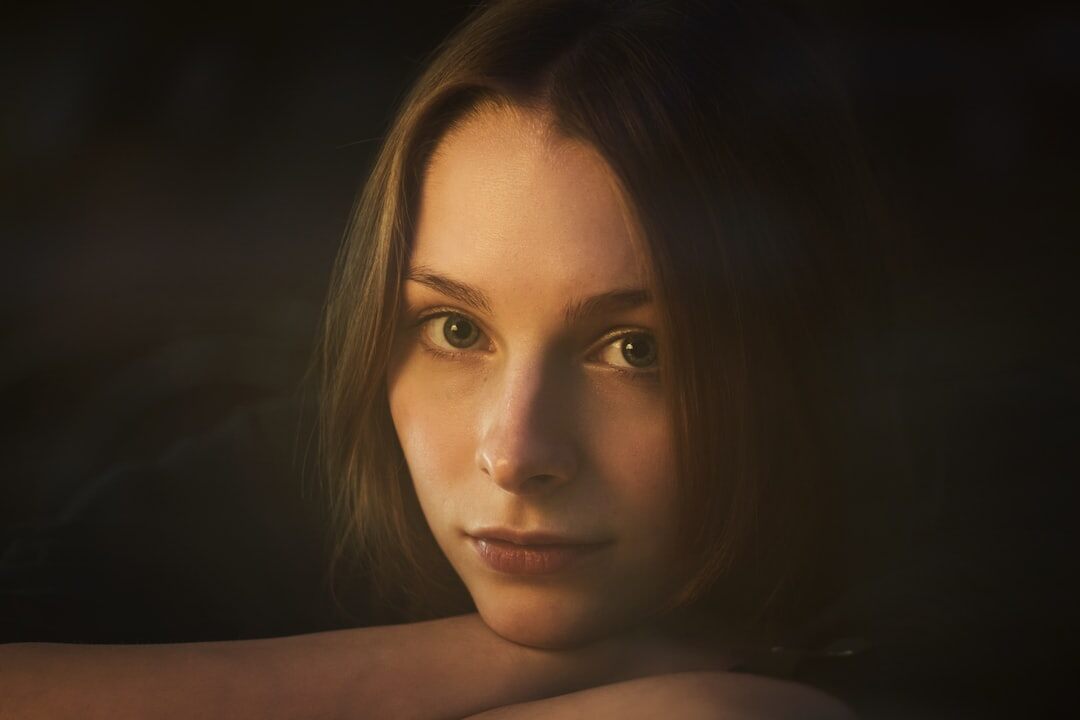 Woman portrait lit by soft window light