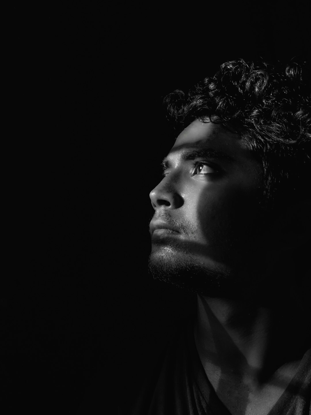 Man in black and white studio portrait