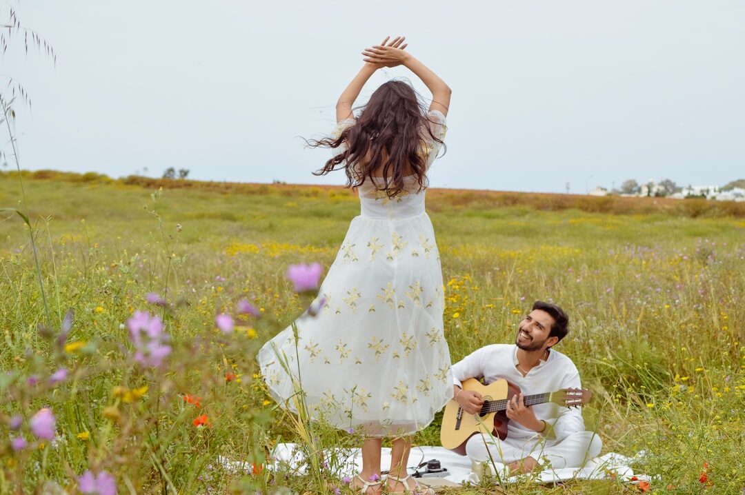 Couple having a picnic in a meadow